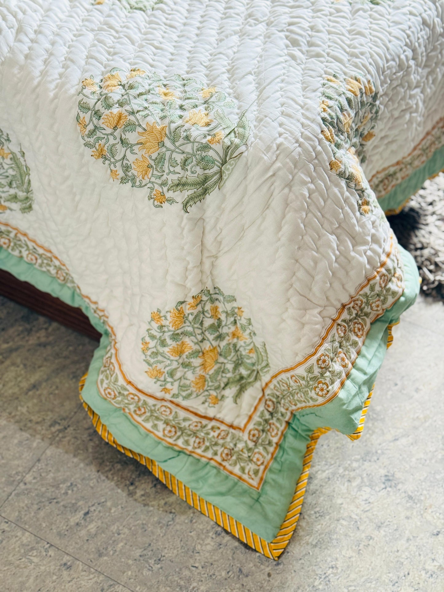 Block printed muslin quilt