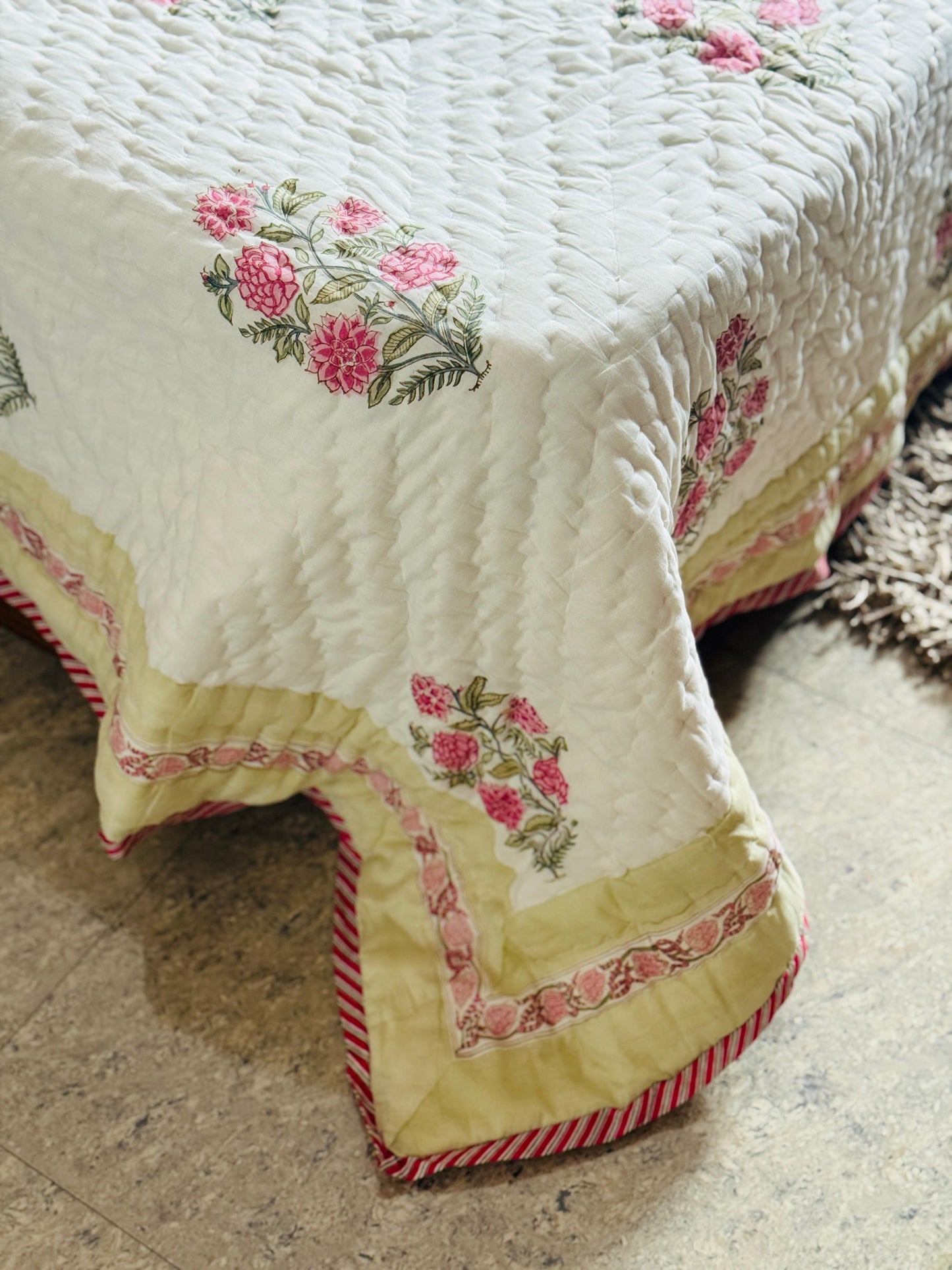 Block printed muslin quilt