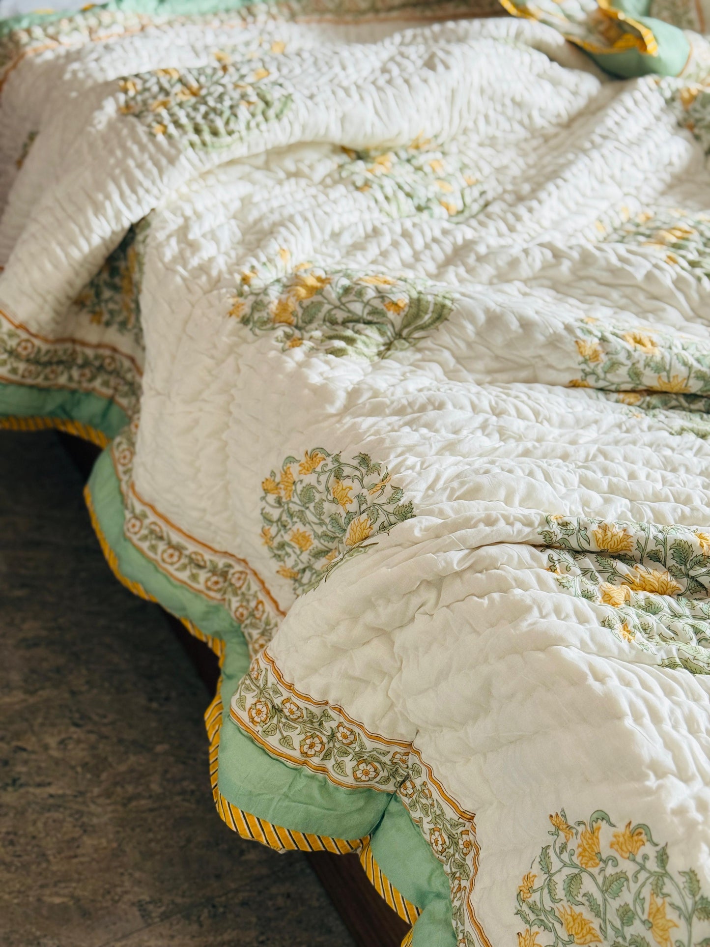 Block printed muslin quilt
